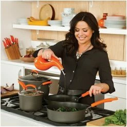 Rachael Ray Hard Anodized II Cookware Set W/ Orange Handles: 10pc 7 Rachael Ray Hard Anodized II Cookware Set W/ Orange Handles: 10pc -Cuisinart Sales Shop rachael ray evoo bottles in use kitchen setting compressed 6 1